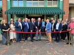 CONSUMERS NATIONAL BANK CUTS RIBBON ON NEW DOWNTOWN CANTON BRANCH